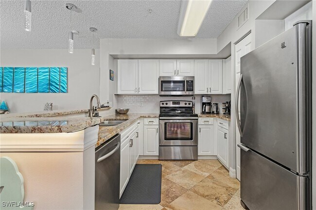 Photo - 1180 Wildwood Lakes Blvd Unidad 208