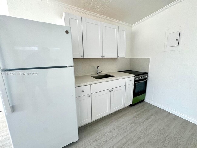 Photo - 104 Commercial Blvd Unidad 4