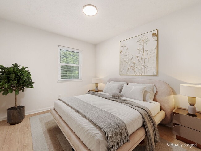 Photo - Half Month FREE — Updated 2BR w/ In-Unit Laundry, Central A/C + 2 Parking Spots | Touring starts ... Unit I