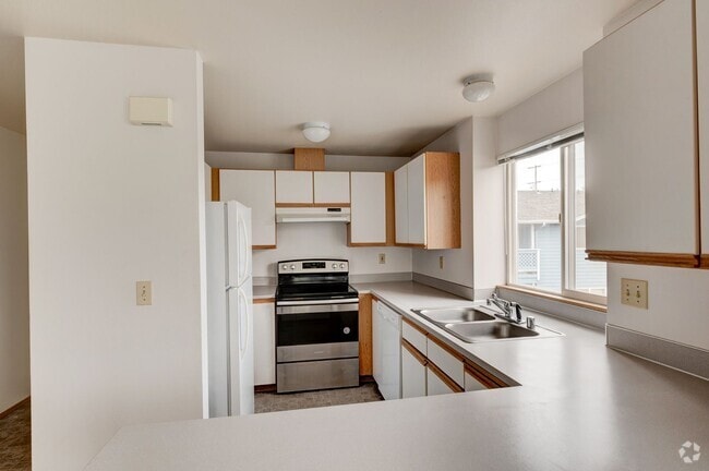 Building Photo - Recently Updated 2-Bedroom 2nd Floor Condo Unit A201
