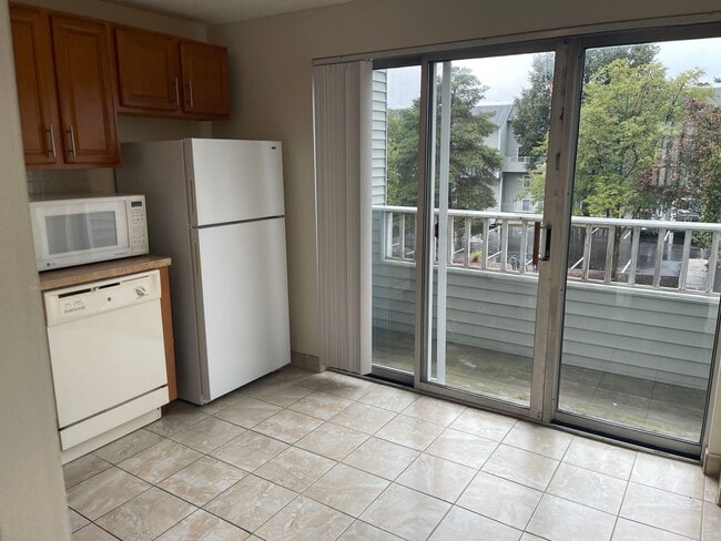 Photo - Modern Duplex with Pool, Parking, 2 balconies and 1 deck, Large Bedrooms, 1.5 bath 1 FREE MONTH