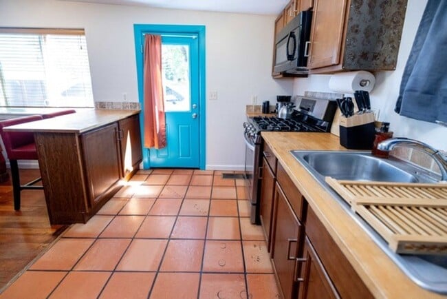 Photo - Modern Comfort with Fireplace & Yard | 2BR...