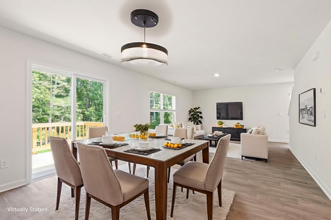 Photo - Light-Filled & Freshly Painted Raleigh Gem!