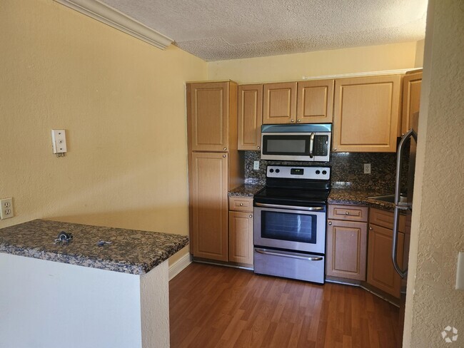 Building Photo - 3860 Coral Tree Cir Unit 305 Rental