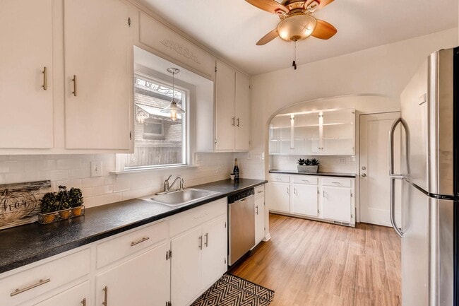 Photo - Charming Main Floor Apartment with Private One-Car Garage