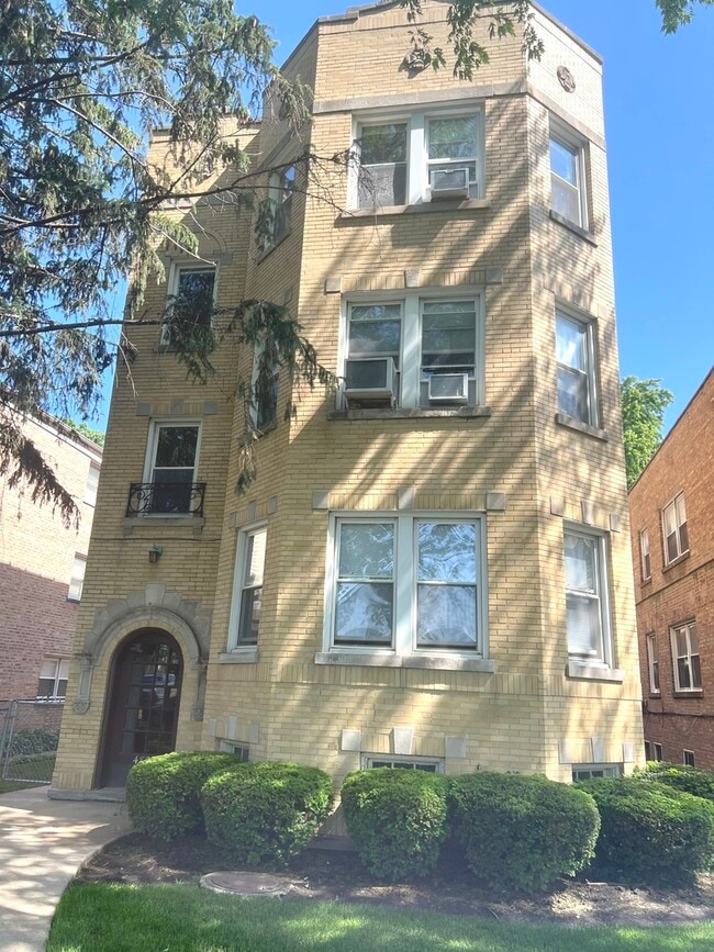 Building Photo - 4824 Mulford St Unit 1