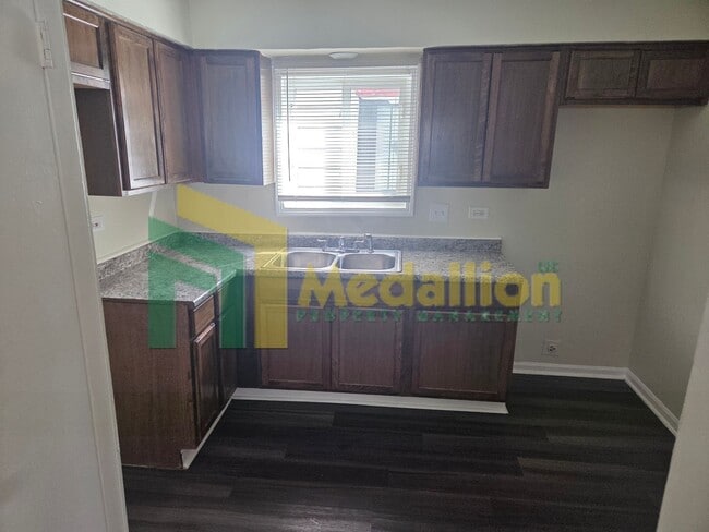 Photo - Updated 4-Bedroom Home with Finished Basement and Fenced Yard