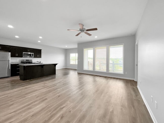 Photo - Spacious 4-Bed, 3-Bath Home with Finished Basement in Raymore, MO – Move-In Ready!