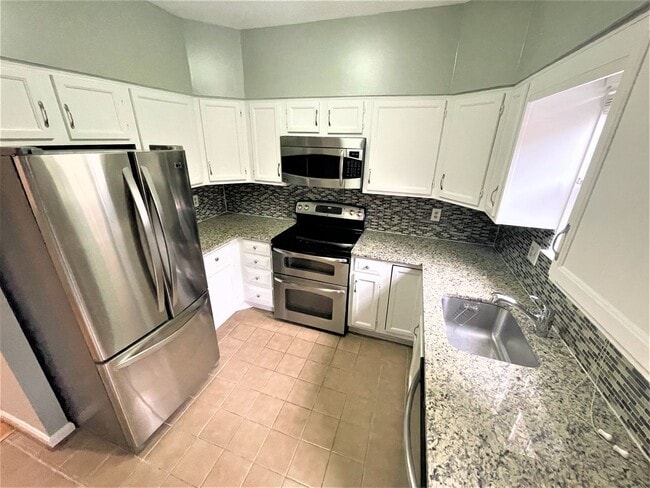 Photo - Updated, all brick 3 level townhouse pet friendly townhouse for rent!