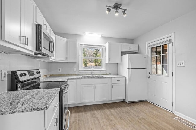 Photo - Beautiful 3BR Home in SE Raleigh - Fully Renovated + HUGE Fenced in Yard!