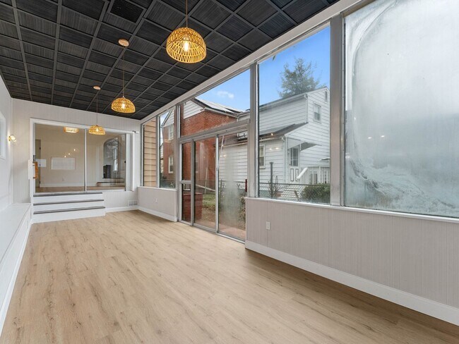 Photo - Newly Renovated Pennsauken Rental with Sunroom-Style Back Room, Glass Wall & Basement