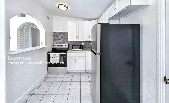 Building Photo - 1906 E 98th Ave Rental