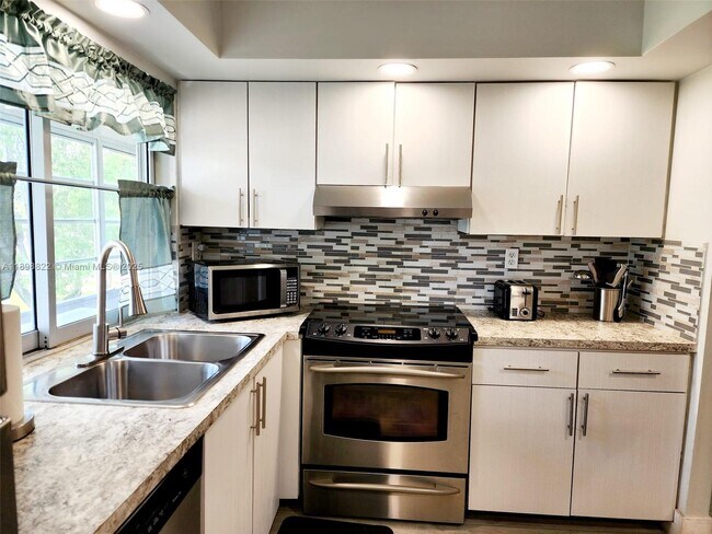 Photo - 9101 Lime Bay Blvd Unit 305