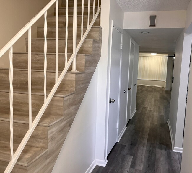 Photo - Two-story condominium, featuring 2 bedrooms and 2 1/2 bathrooms