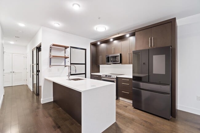 Building Photo - 6401 Park Ave Unit 402