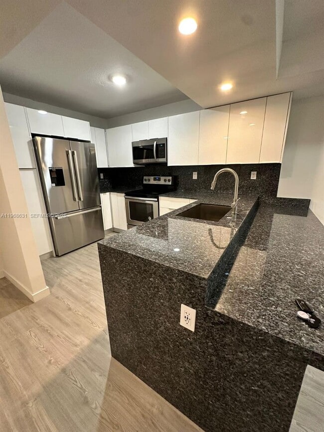 Building Photo - 4640 NW 102nd Ave Unit 104-16