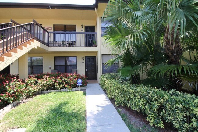 Building Photo - 4706 Lucerne Lakes Blvd Unit 104