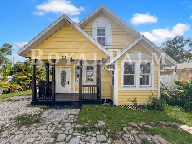 Building Photo - Deck the halls or the French doors, because this charming century-old single family home is avail...