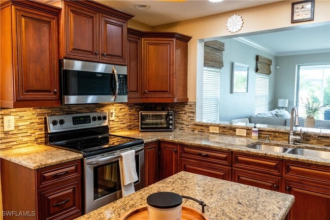 Building Photo - 8340 Mystic Greens Way Unit 1501