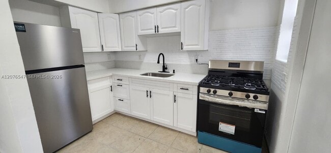 Building Photo - 736 83rd St Unit 2