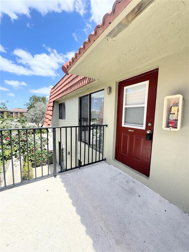 Building Photo - 11352 Royal Palm Blvd Unit 11352