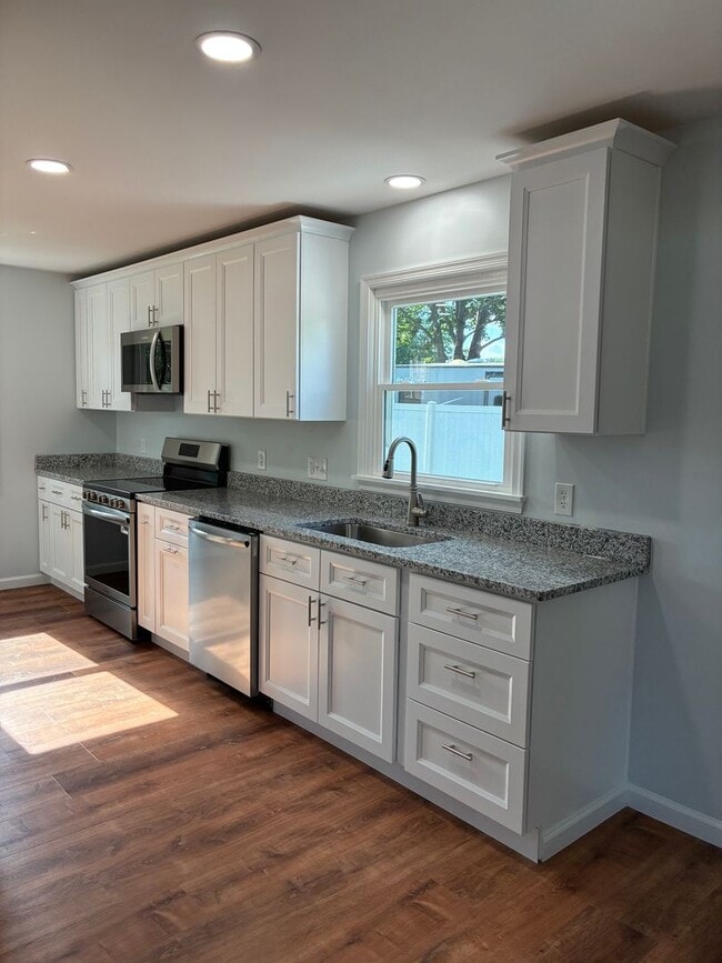Photo - Two Full Living Areas — One Incredible Hom...