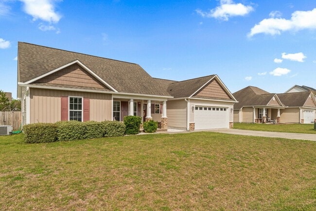 Photo - Open Floor Plan with Covered Patio & Fire Pit