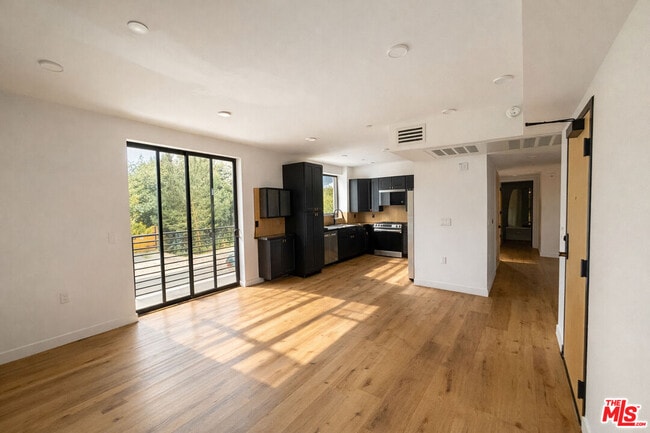 Building Photo - 10867 Fruitland Dr Unit 201