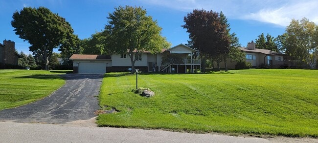 Building Photo - Beautiful home with peek a boo views of West Bay on Old Mission Peninsula