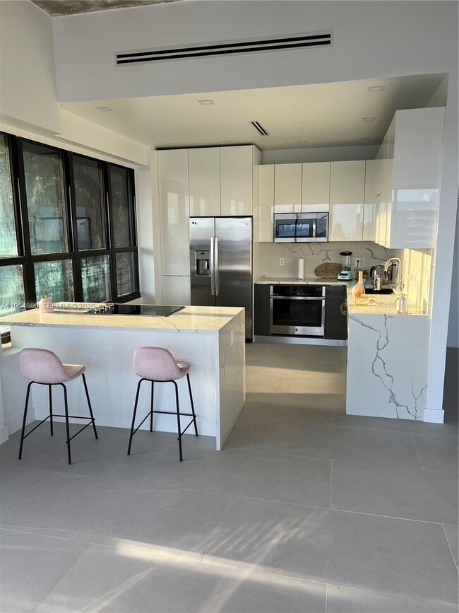 Photo - 780 NE 69th St Unit T3