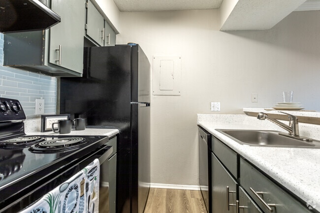Open-Concept Kitchen and Living Area – Perfect for Entertaining and Everyday Comfort - Fountains of Jupiter Apartments