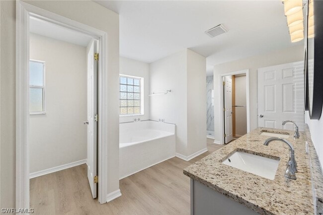Building Photo - 4BR Home in Gated Town Lakes Community with Lake View
