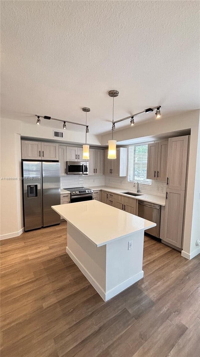 Building Photo - 8894 NW 44th St Unit 6-114