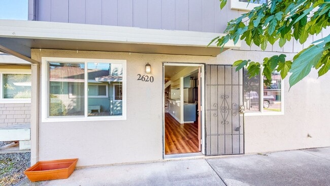 Photo - 2 story 2 bedroom 1 bath condo with covered parking, private storage and community pool!