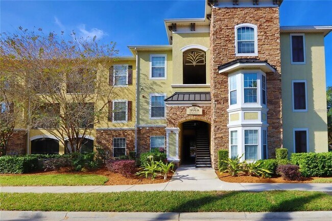 Building Photo - 9918 Courtney Palms Blvd Unit 201