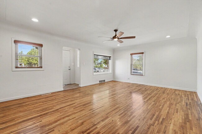 Photo - Spacious 4-Bedroom, 2-Bath Home with Large Yard, Garage & Central A/C