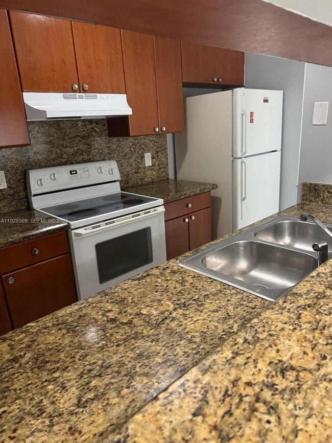 Building Photo - 11580 NW 43rd Ct Unit 11580