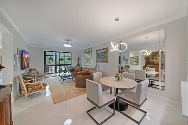 Building Photo - 6241 Pointe Regal Cir Unit 403