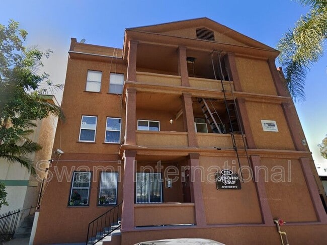 Building Photo - 1131 S Beacon St Unit 03