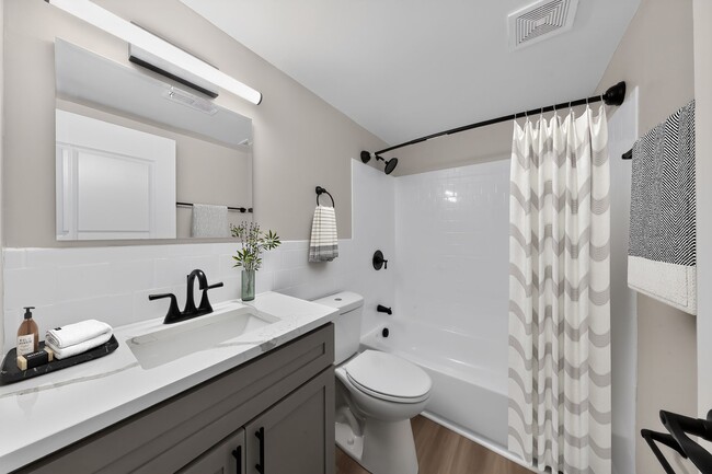 Step into modern elegance at Eagle Rock Apartments at Bel Air. This stylish bathroom features sleek fixtures, a spacious vanity, and a welcoming ambiance. Elevate your living experience today—schedule a tour and envision your new home!