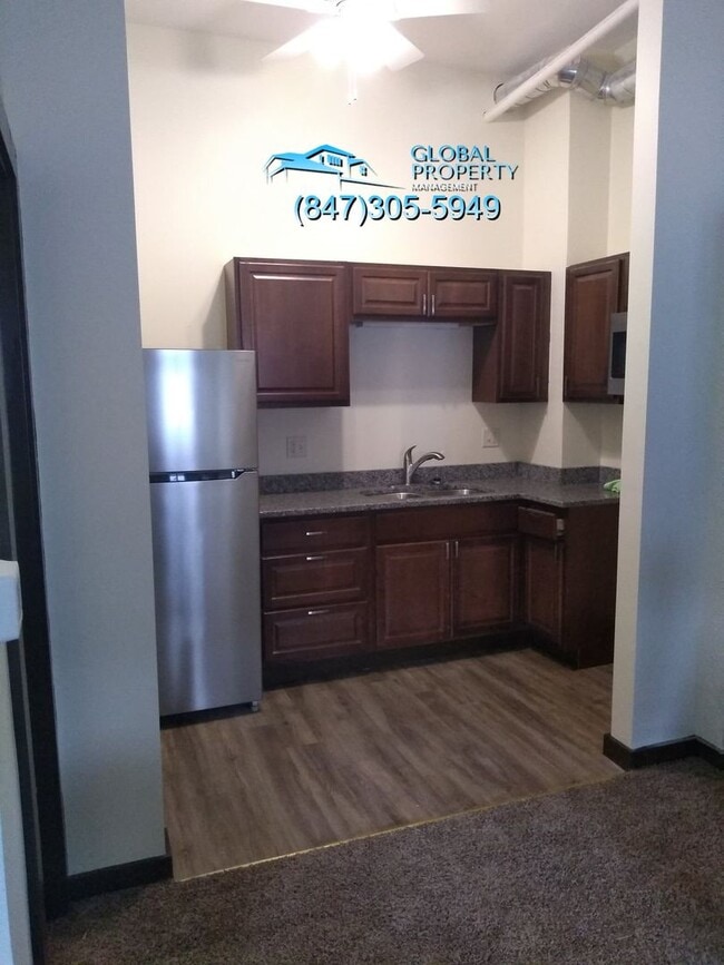 Building Photo - 6311 27th Ave Unit #1