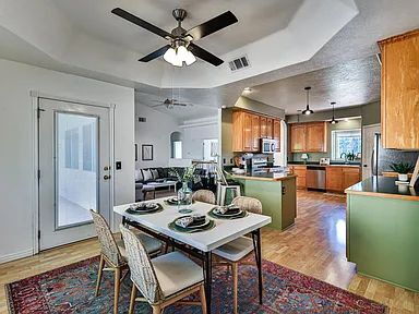 Photo - "Charming 4-Bed Oasis with Elegant Hardwoo...
