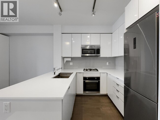 Photo - 10011 River Dr Unité 5xx