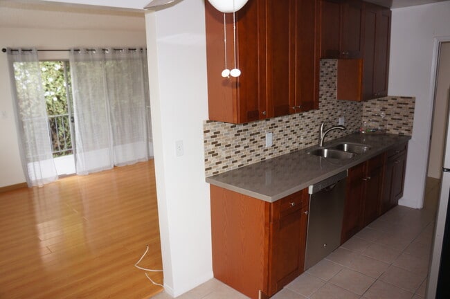 Living room and kitchen - 4207 Franklin Ave Apartments Unit 6