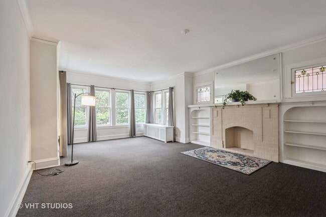 Building Photo - 6335 N Claremont Ave Rental