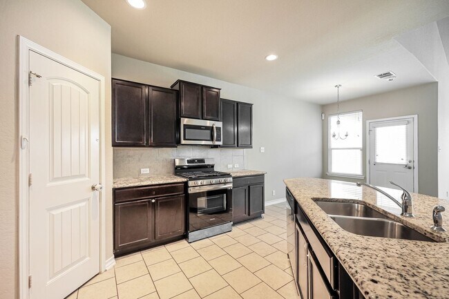 Photo - 5 BR/3.5BA | Newly Renovated Single Family Home | 1-Car Garage Parking | Fenced Backyard!