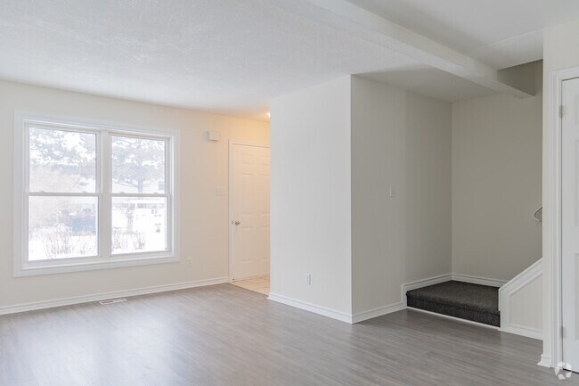 3BR, 1.5BA - Living Room - Stoneglen Townhouses