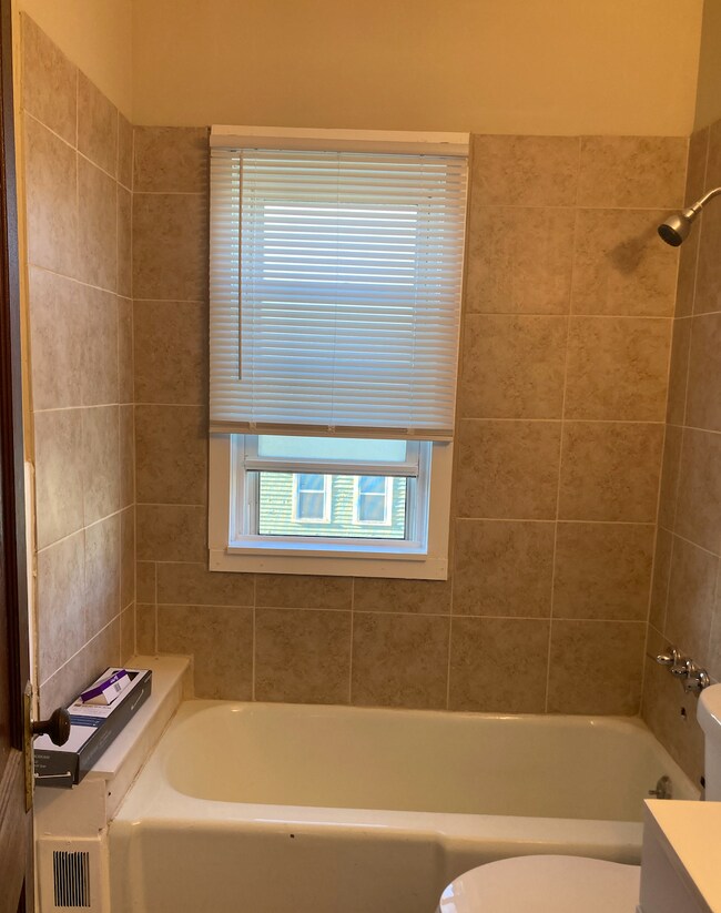 Renovated Bathroom - 1 - 2808 E 124th St Unit Upstairs