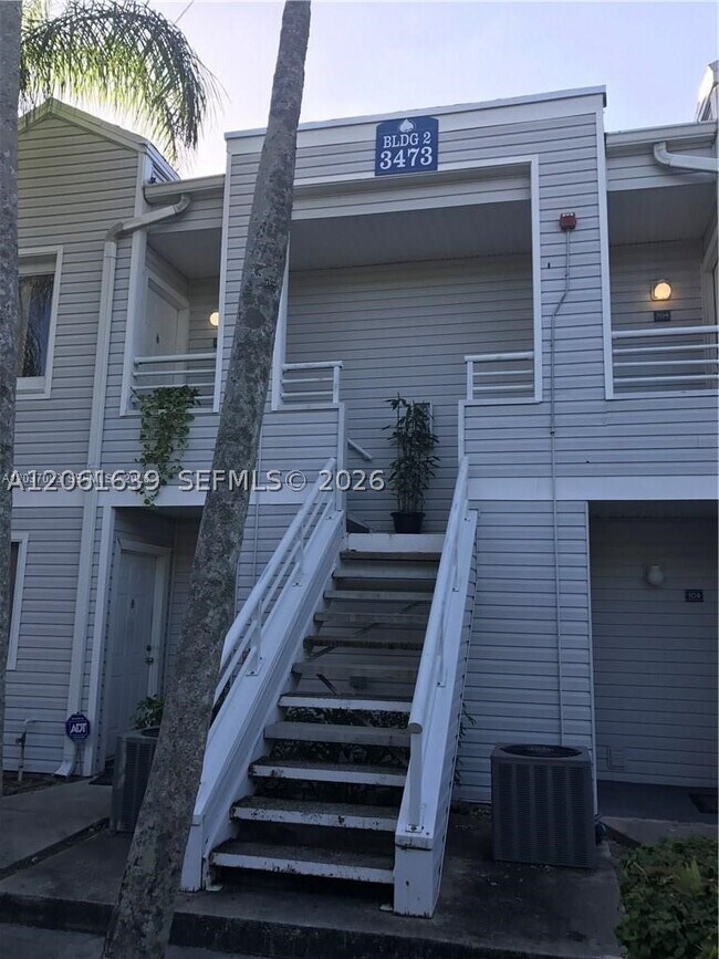 Building Photo - 3473 NW 44th St Unit 103