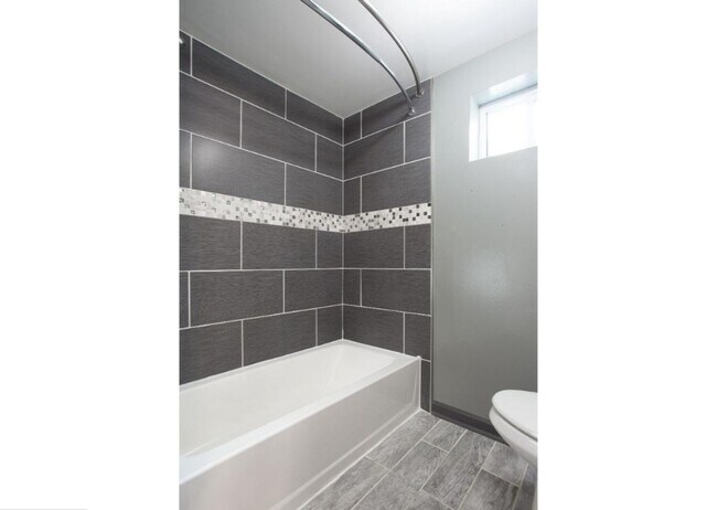Photo - Spacious 3-Bedroom Home with Central Air, In-Unit Laundry and Patio